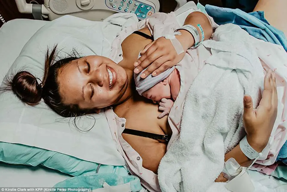 Partner childbirth: a man burst into tears, looking at his wife in the hospital &#8211; real photo