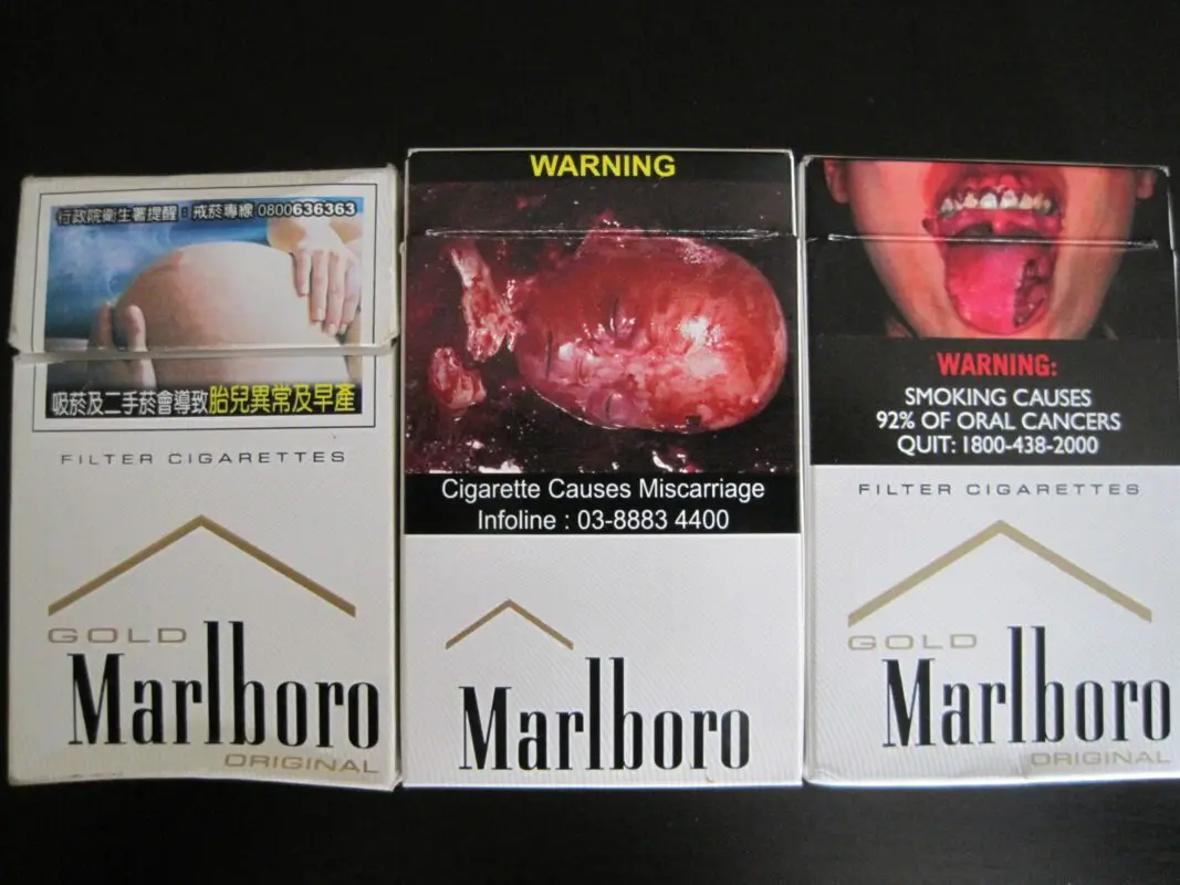Pictures against smoking on cigarette packs
