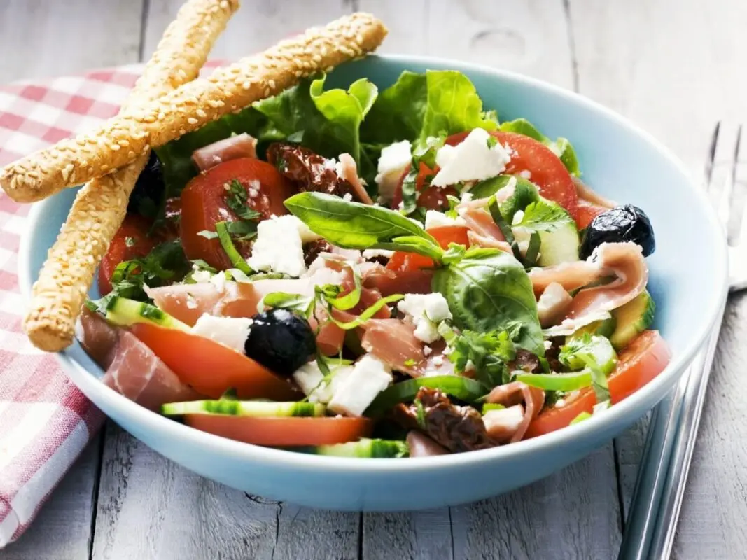 Salad with ham, mushrooms and tomatoes. Video