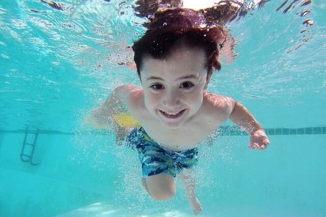 Swimming for children: sports from what age, cons, pros, benefits, harms