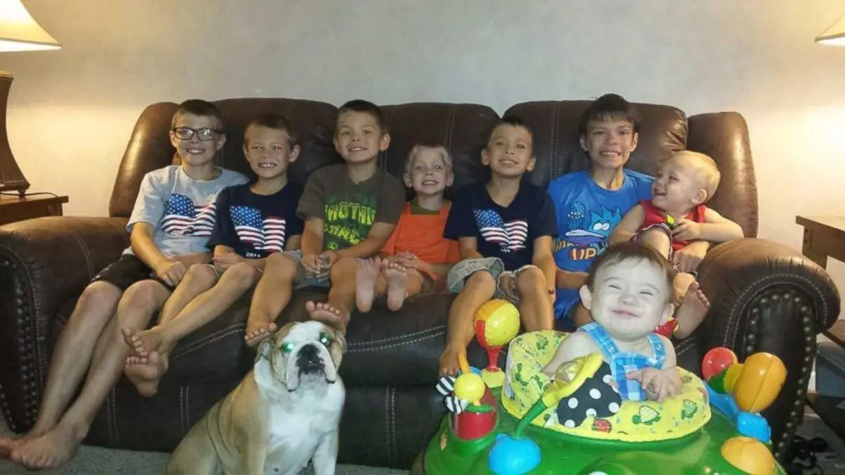 The couple adopted eight sons from the same family