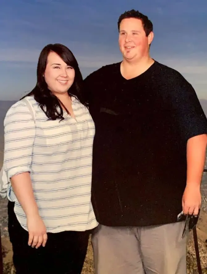 The couple lost 146 kilograms for two to become parents