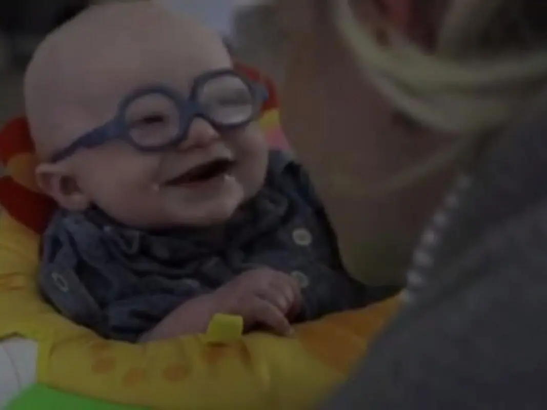 They bought glasses for the kid, and he saw his mother for the first time