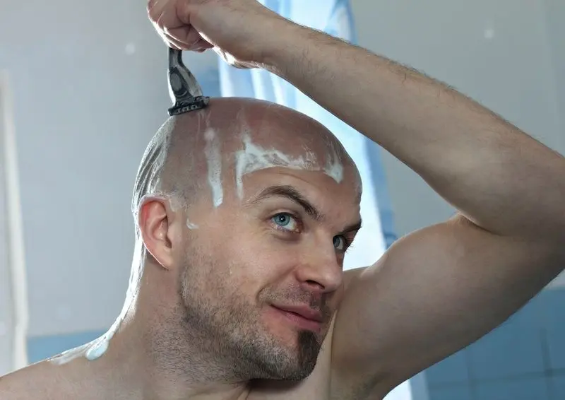 Why do men shave their heads