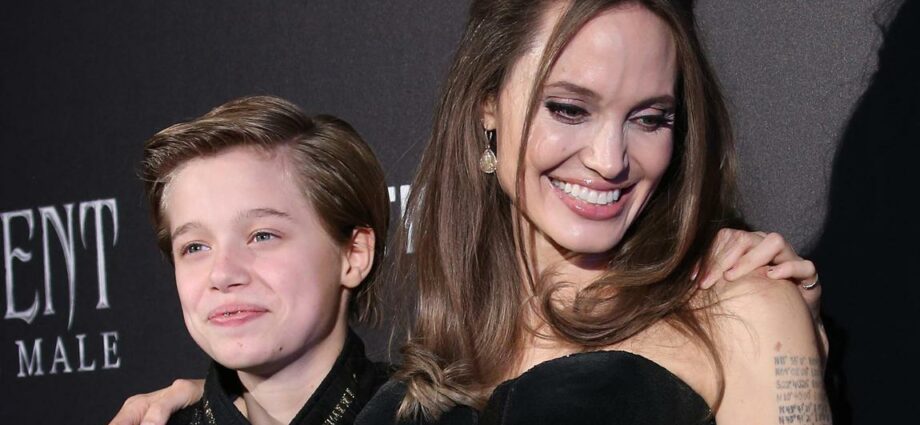 Angelina Jolie en Brad Pitt, hun dochter Shiloh in 100% jongensachtige mode