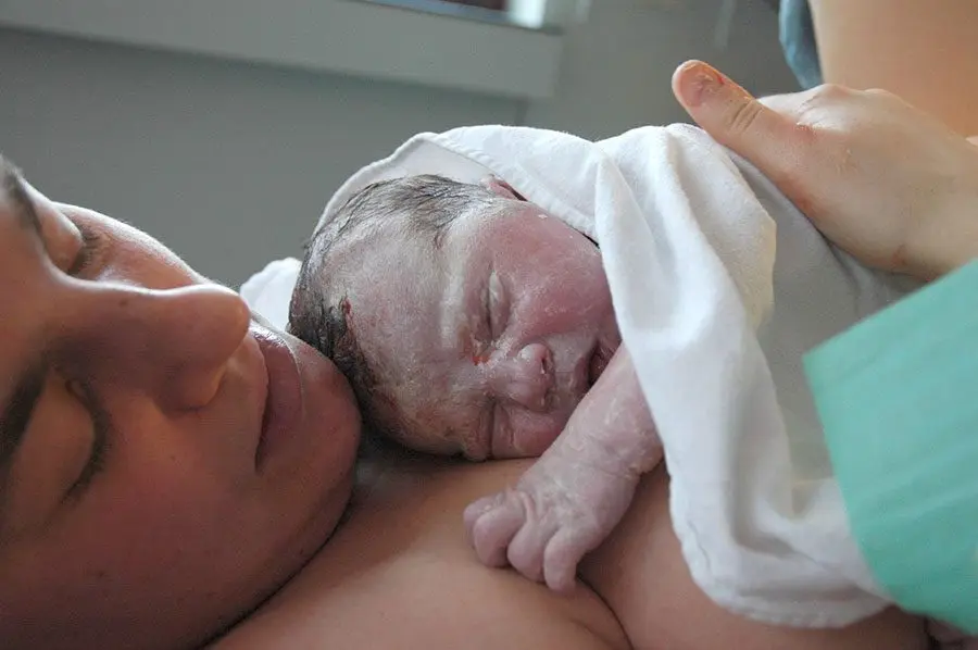 Birth: first aid given to baby