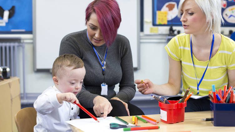 Signs associated with speaking: mothers and childcare professionals testify