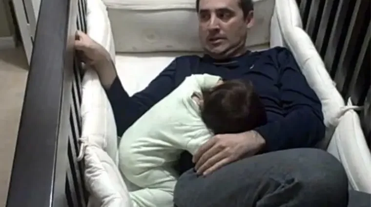 This daddy gets his baby to sleep in less than a minute!