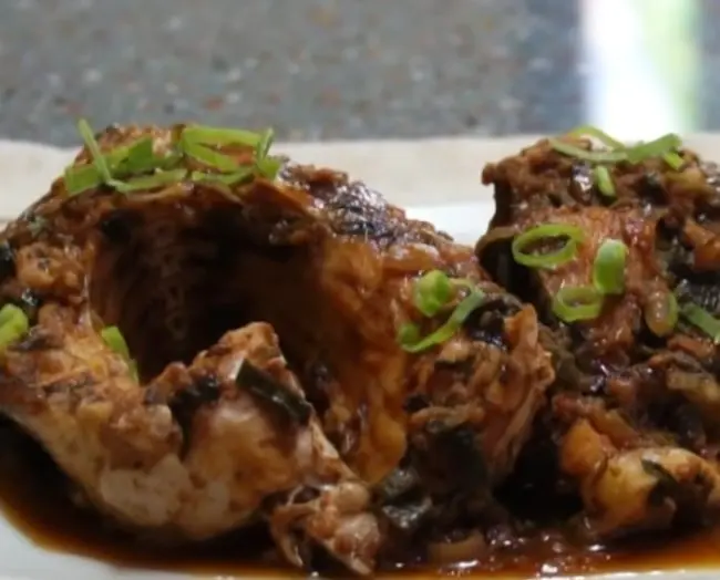 Braised carp in beer with raisins in Czech style