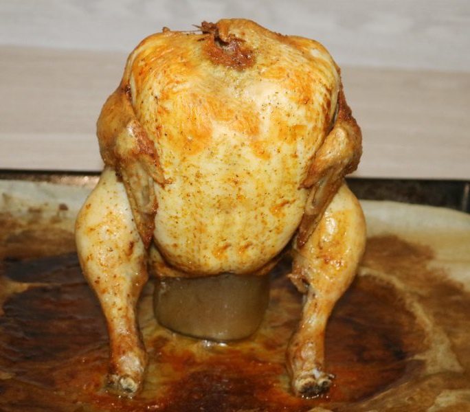 Chicken baked on a can of beer