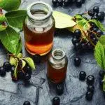 Chokeberry tincture with vodka, alcohol and moonshine