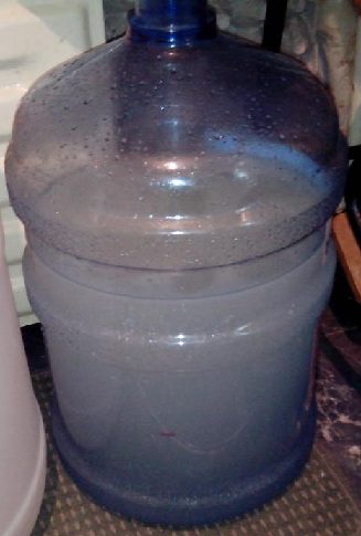 Cleaning moonshine with vegetable oil