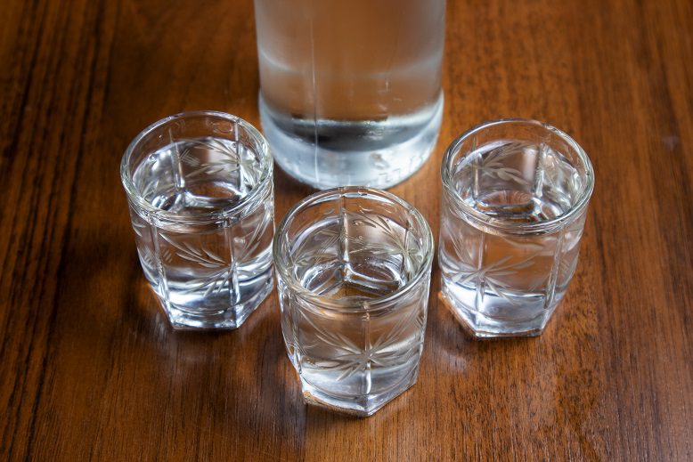 Cleaning moonshine with vegetable oil