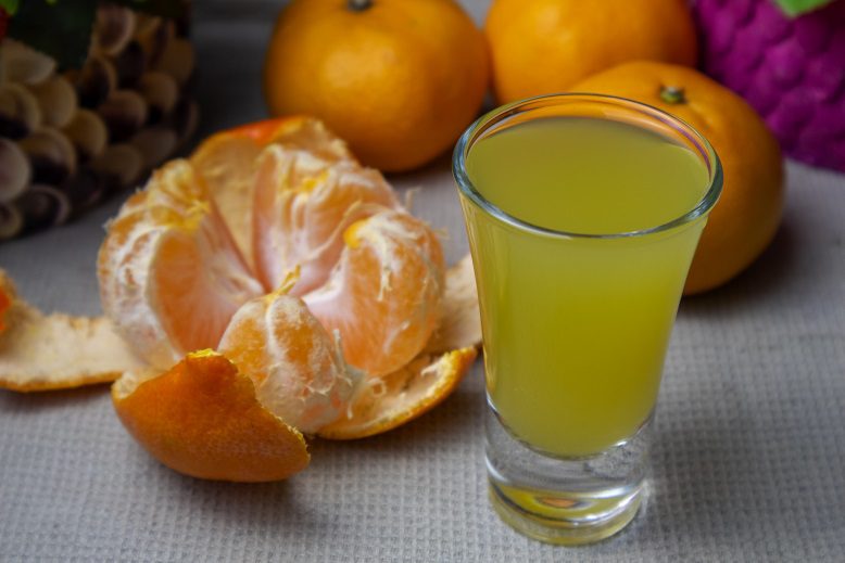 Festive tangerine zest with spruce branches