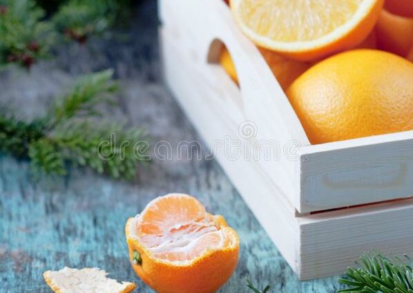 Festive tangerine zest with spruce branches