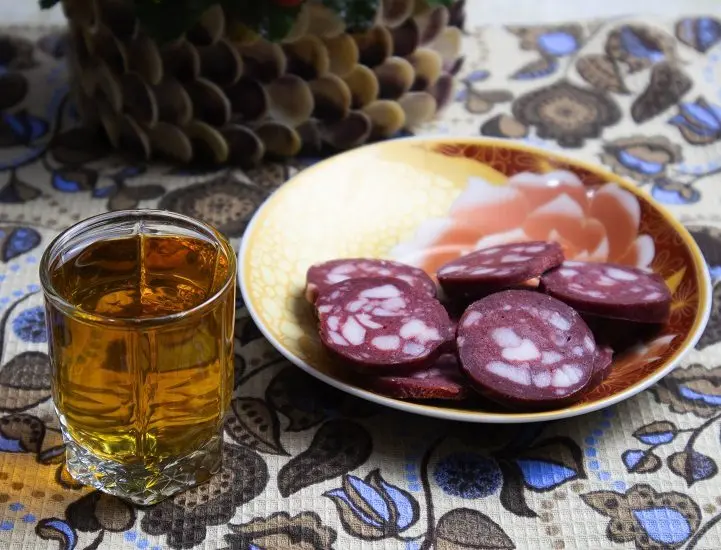 Homemade bacon tincture with lemon zest