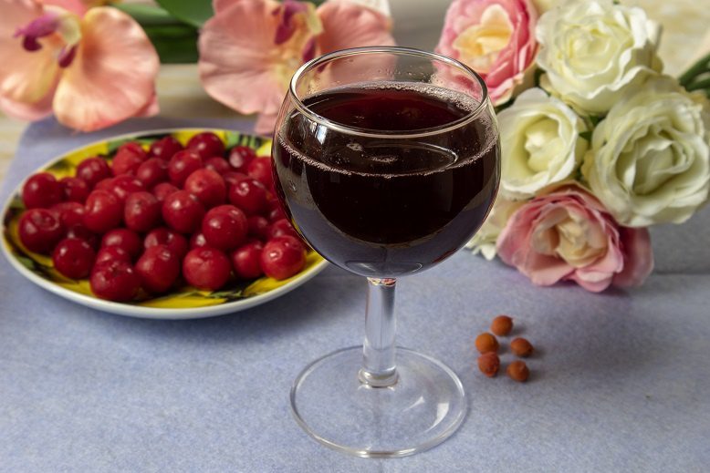 Homemade cherry wine with pits