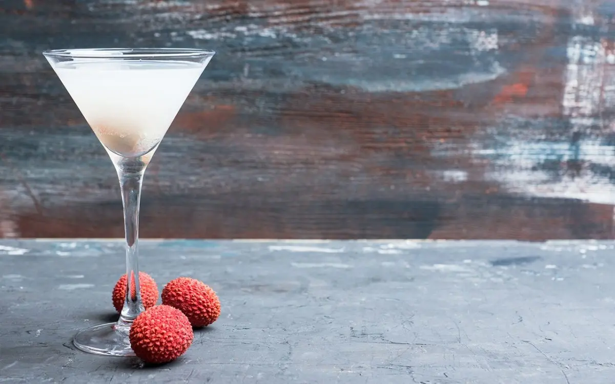 Homemade lychee liqueur with lime