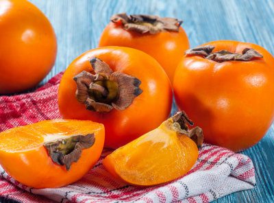 Homemade persimmon tincture with oranges