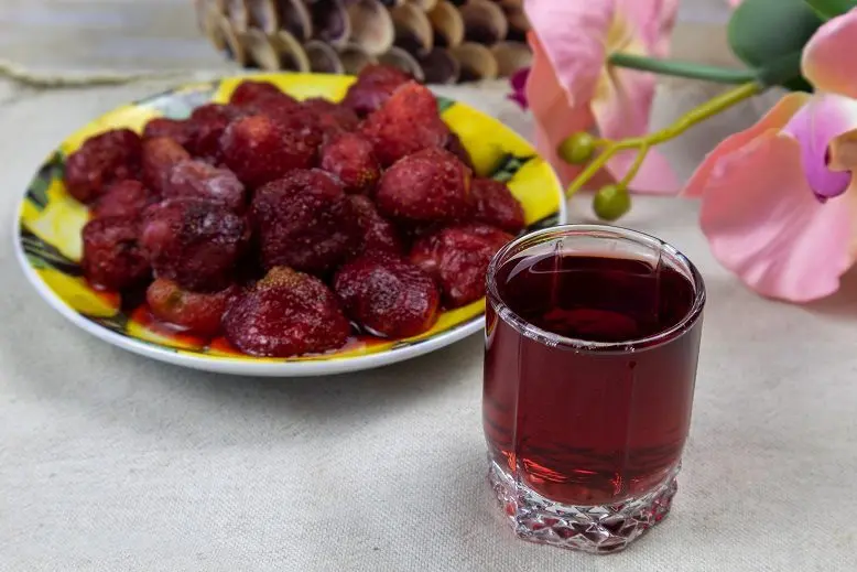 Homemade strawberry liqueurs with and without vodka