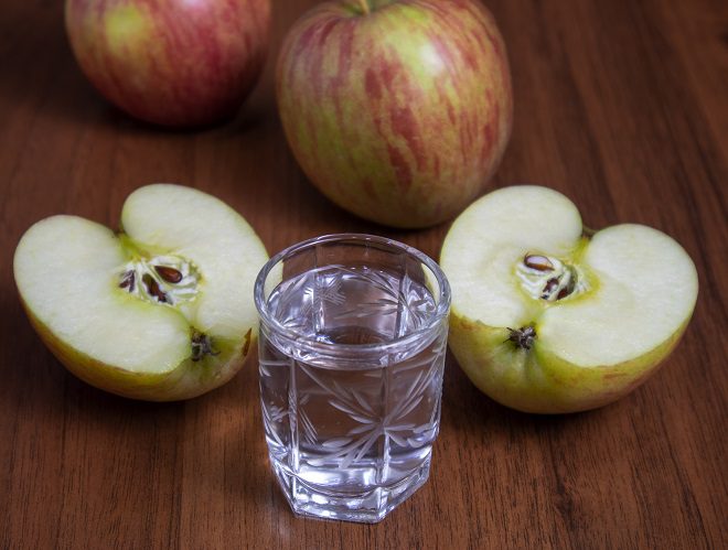 Homemade vodka with apple flavor