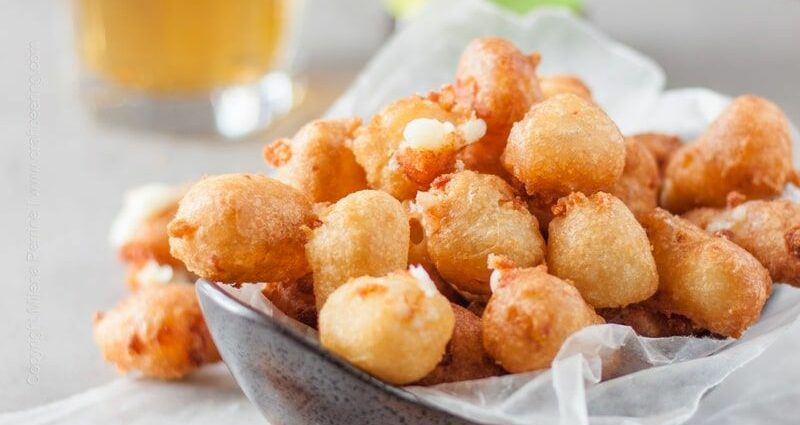 Snack for beer: fried cheese in batter