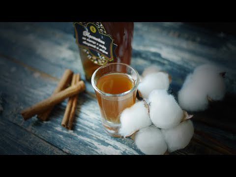 Spicy drinking tincture on cinnamon with coffee, cloves and honey