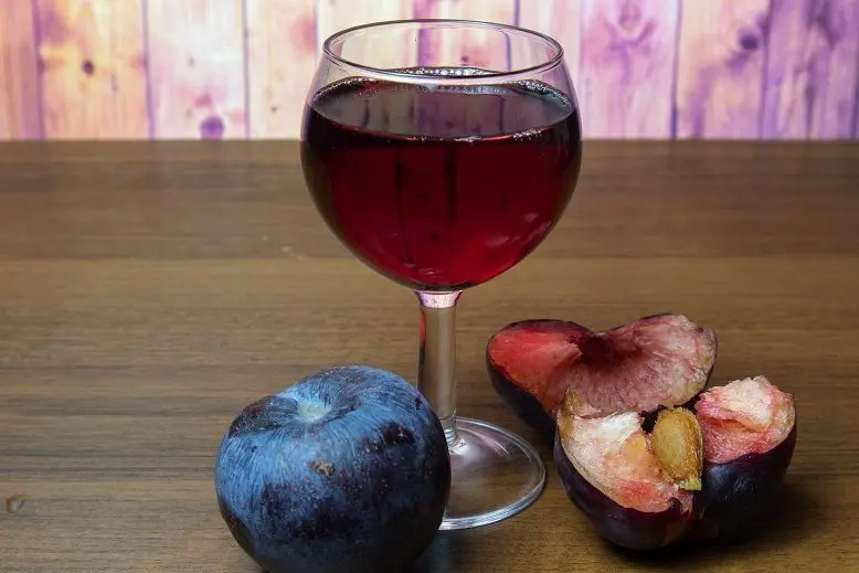 The technology of making wine from plums with pits