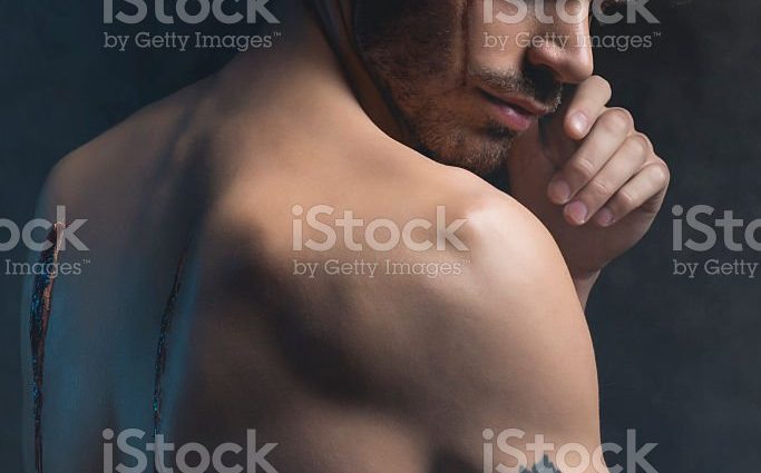 A man with a scar