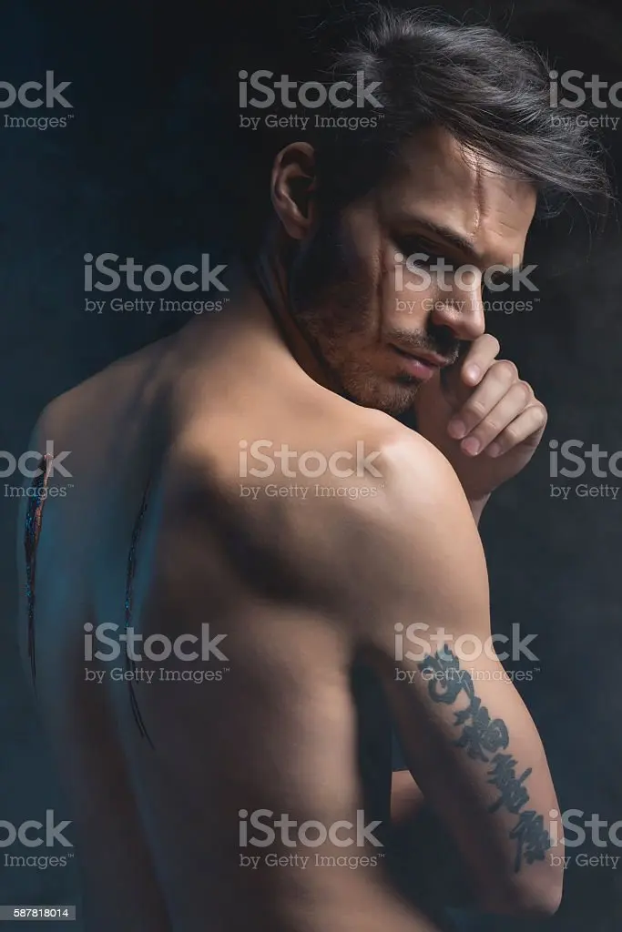 A man with a scar