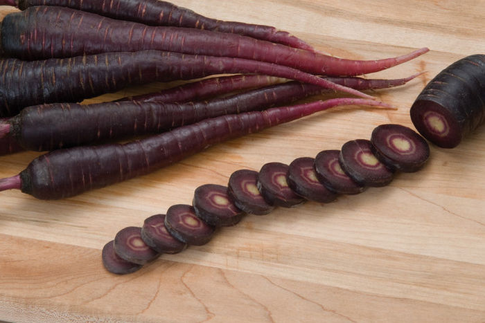 Black carrots: description, useful properties, harm and contraindications, areas of application + secrets of planting and care