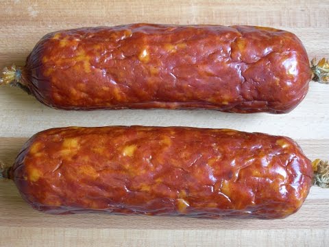 Boiled-smoked sausages from meat of turkeys, pork, beef and other types of meat