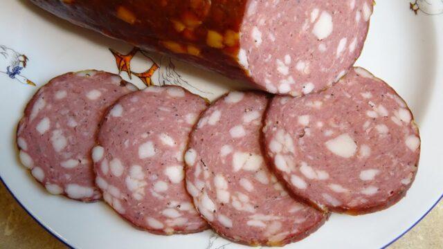 Boiled-smoked sausages from meat of turkeys, pork, beef and other types of meat