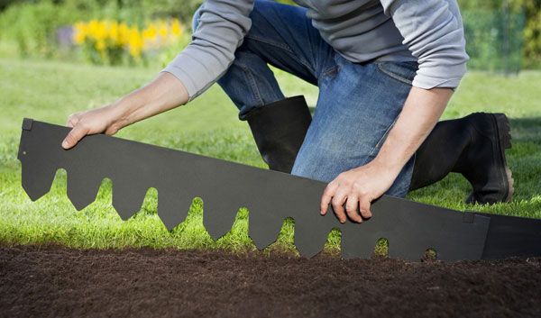 Borders for garden paths (made of stone, polymer tape, improvised materials): installation methods + photos of ready-made solutions