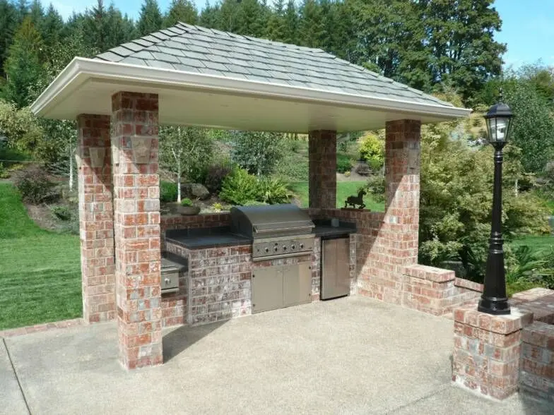 Brick barbecue in the gazebo 