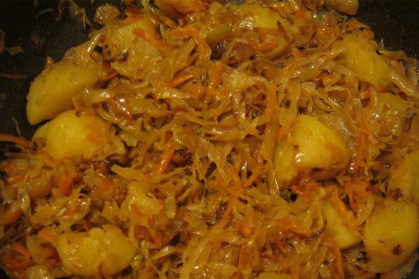 Cabbage with mushrooms and potatoes in a slow cooker and oven