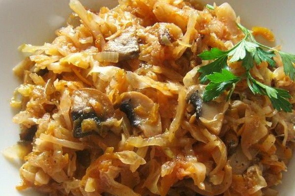 Cabbage with mushrooms and potatoes in a slow cooker and oven