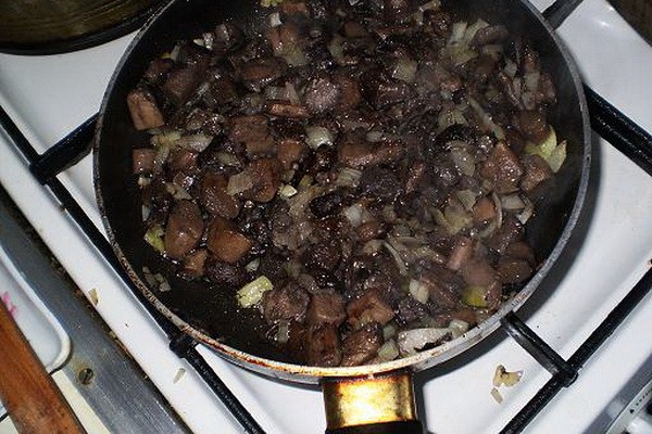 Cabbage with mushrooms and potatoes in a slow cooker and oven