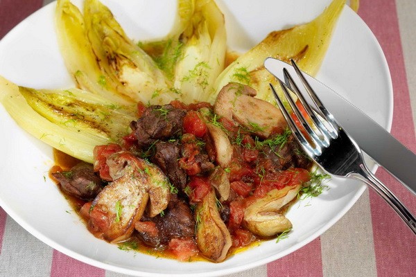 Cabbage with mushrooms and potatoes in a slow cooker and oven