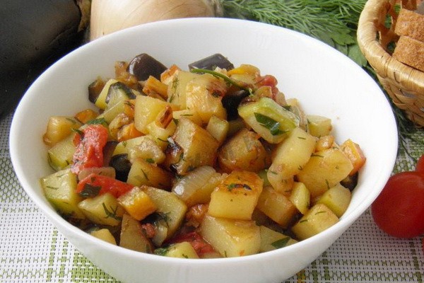 Cabbage with mushrooms and potatoes in a slow cooker and oven