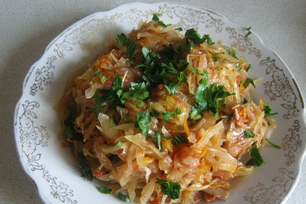 Cabbage with mushrooms and potatoes in a slow cooker and oven