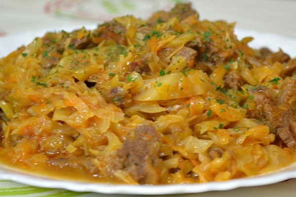 Cabbage with mushrooms and potatoes in a slow cooker and oven