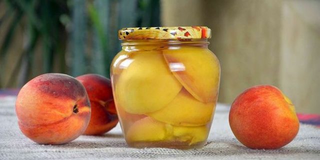 Canned peaches in syrup for the winter