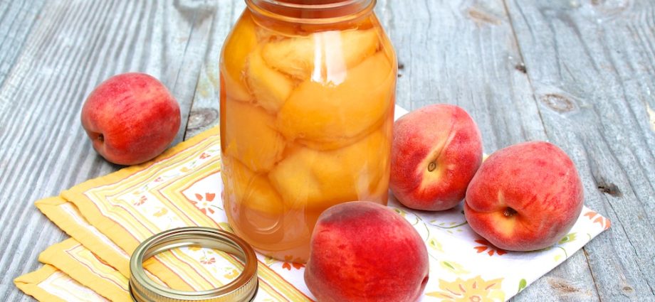 Canned peaches in syrup for the winter