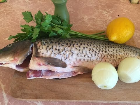 Carp in the oven in foil: whole, slices, steaks, fillets