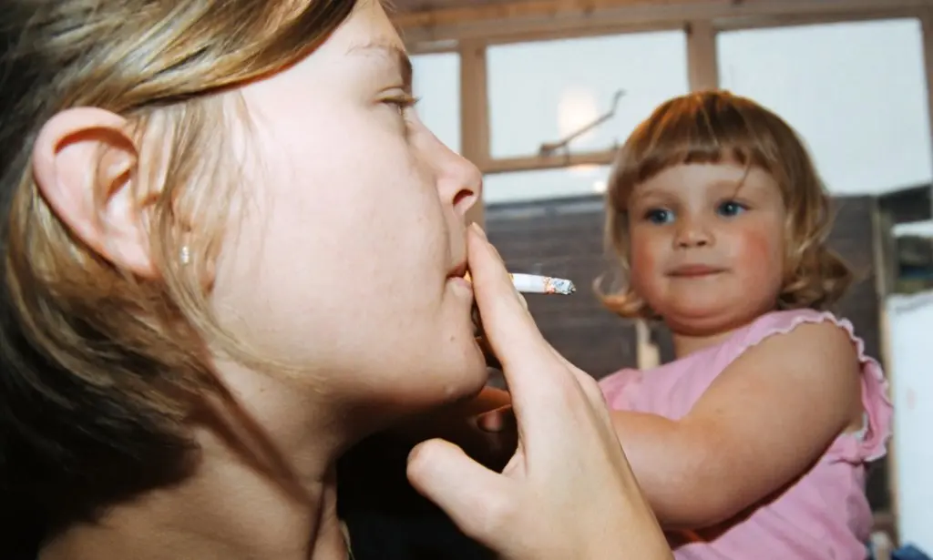 Children who smoke passively have a lower cough reflex