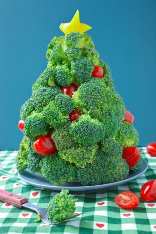 Christmas tree made of fruits for the New Years table with your own hands