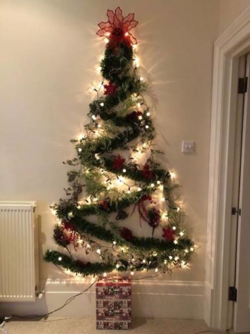 Christmas tree made of garlands and tinsel: on the wall with your own hands, from sweets, cardboard, wire