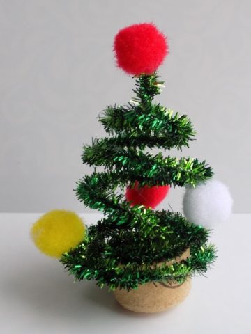 Christmas tree made of garlands and tinsel: on the wall with your own hands, from sweets, cardboard, wire