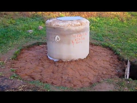 Clay castle for a well made of concrete rings: how to do it yourself, photo